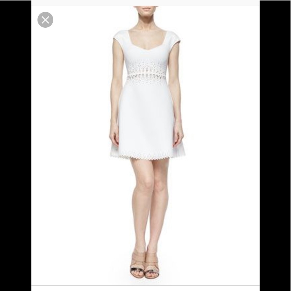 Clover Canyon White Lasercut Dress. NWT size XS.